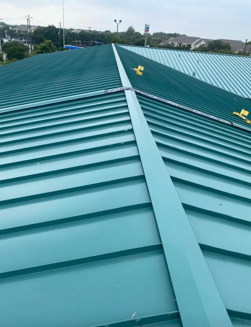 Green commercial metal roof ridge and valley for Metal Roof Repair in Newberry